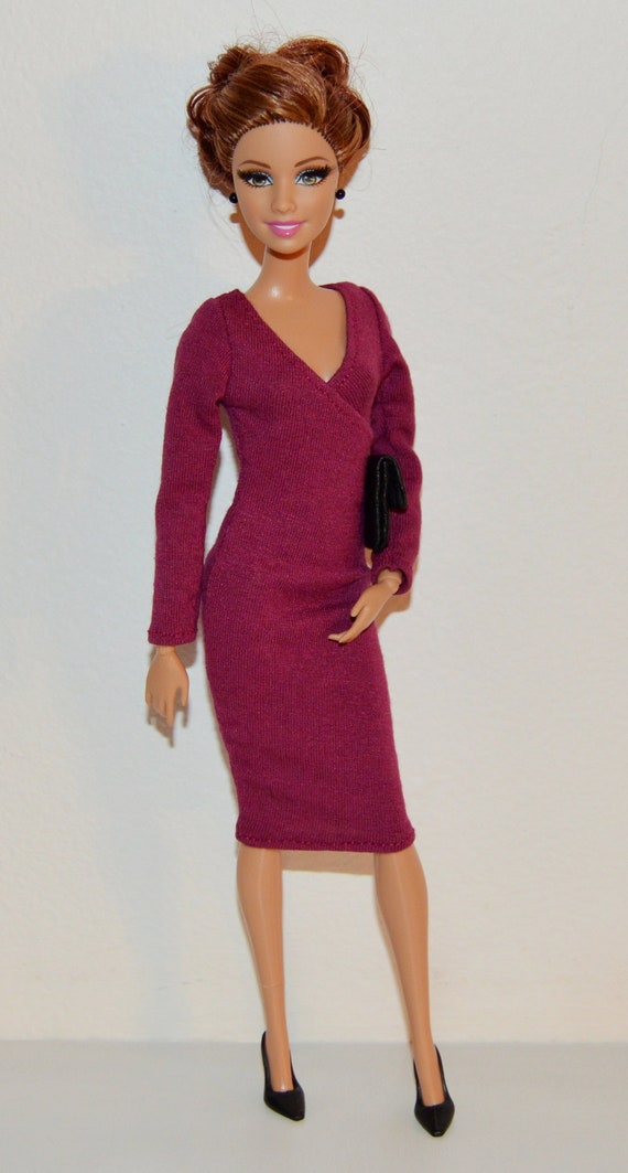 barbie doll in red dress