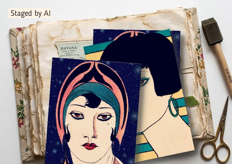 May include: Two rectangular art prints featuring stylized portraits of individuals with dark hair, bold makeup, and headwear. The foreground print shows a face against a dark blue starry background, while the partially visible print behind it features a yellow background.