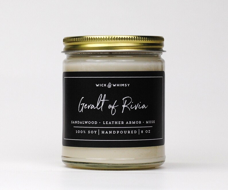 Geralt of Rivia candle, black label on clear jar with gold lid