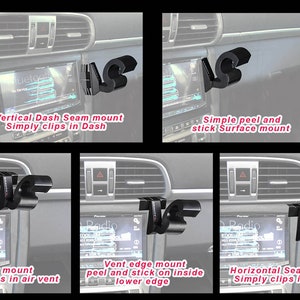 May include: A black phone mount with different mounting options. The mount can be clipped to a car vent, attached to a dash seam, or stuck to a surface. The mount is shown in different positions in a car.