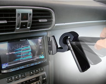 Gravity X Car Phone Mount award winning patented design uses only Gravity and leverage, mounts in seconds with one hand