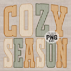 May include: The words "COZY SEASON" are displayed in a bold, striped font. The letters are a mix of orange, green, and white stripes, set against a light brown, wood-grain background. A small circle with the text "Pink Anchor PNG file" is in the center.