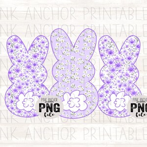 May include: Three Easter bunny cutouts with a floral pattern in shades of purple and white. Each bunny has a cloud-shaped tail. The text "PINK ANCHOR PNG file" is visible on the image.