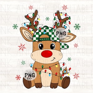 May include: A cartoon illustration of a reindeer wearing a green and white checkered hat and a red nose. The reindeer is adorned with Christmas lights and snowflakes. The image includes the text "PINK ANCHOR PNG file".