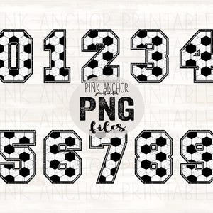 May include: A collection of black and white soccer ball-patterned numbers 0 through 9. Each number has a distressed, vintage look with a black outline. The text "PINK ANCHOR PRINTABLES PNG files" is also visible.