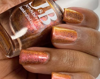 Can't We Just Squash This? Rose gold/gold multichrome, linear holographic nail polish with chrome chameleon flakies. By Jen & Berries