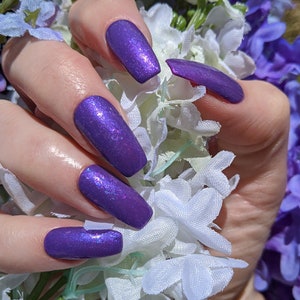 Lilac Arches Lilac Festival  purple nail polish with pink/purple shimmer and crystal chameleon flakies. Handmade by Jen & Berries