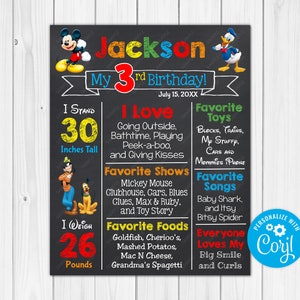 May include: A personalized chalkboard-style birthday sign featuring Mickey Mouse and Donald Duck. The sign includes the name "Jackson", age, height (30 inches), weight (26 pounds), favorite things, and the text "Personalize with Corjl".