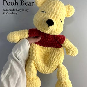 Handgestrickte Baby Kuscheldecke von Pooh Bär