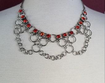 Upcycled chainwork and red crystal festoon necklace