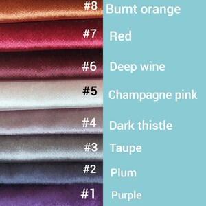 May include: Eight fabric swatches in different colors, numbered 1 through 8. The colors are purple, plum, taupe, dark thistle, champagne pink, deep wine, red, and burnt orange.