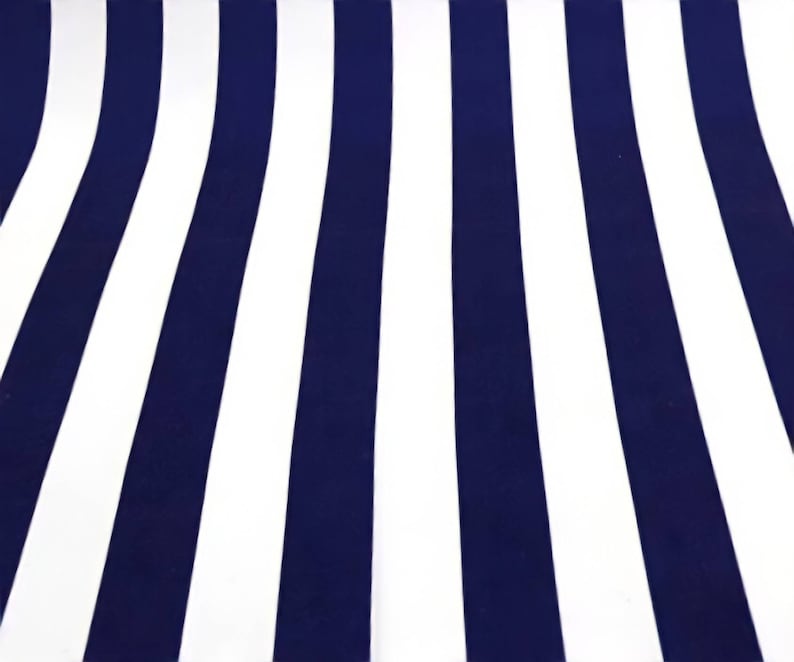 May include: A fabric with alternating navy blue and white stripes. The stripes are vertical and run the length of the fabric.