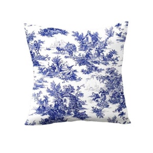 May include: Blue and white patterned throw pillow with a toile design featuring a cottage and figures in a landscape.