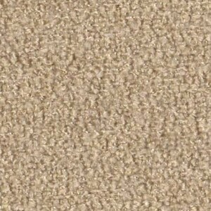 Op de afbeelding: Close-up van een beige, textuurrijke stof met een subtiel geweven patroon. De stof heeft een zachte, pluche uitstraling.
