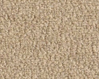 May include: Close-up of a beige textured fabric with a subtle woven pattern. The fabric has a soft, fuzzy appearance.