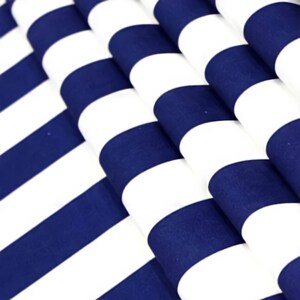 May include: Close-up of a blue and white striped fabric. The fabric is folded and the stripes are horizontal.