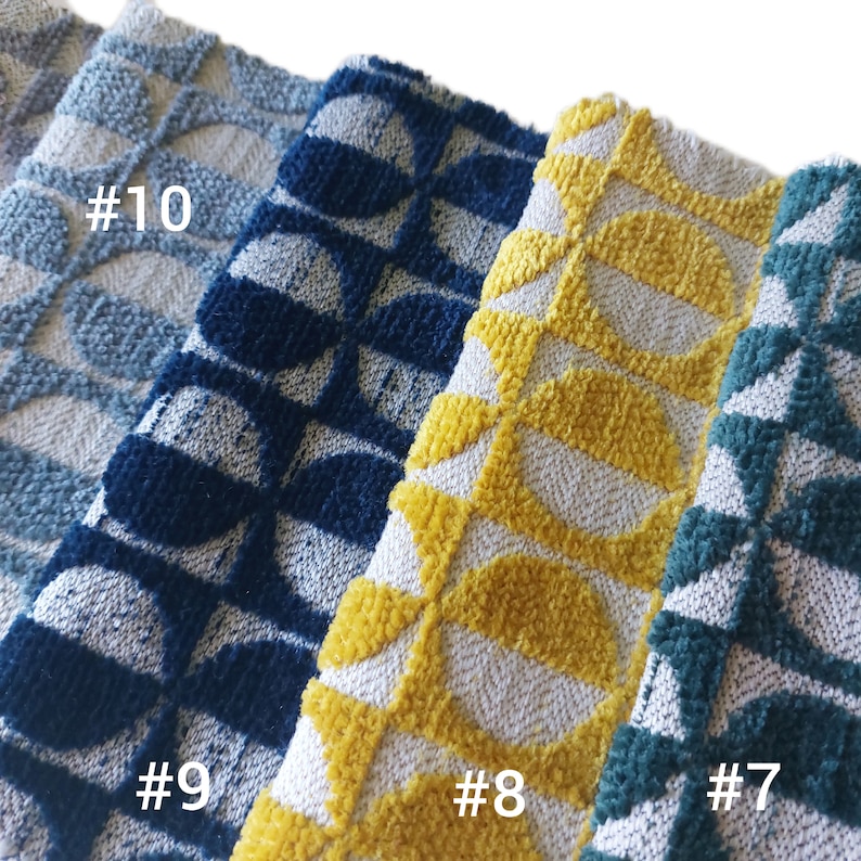 May include: Four fabric swatches with a geometric pattern. The swatches are in shades of blue, yellow, teal, and gray. The swatches are labeled #10, #9, #8, and #7.
