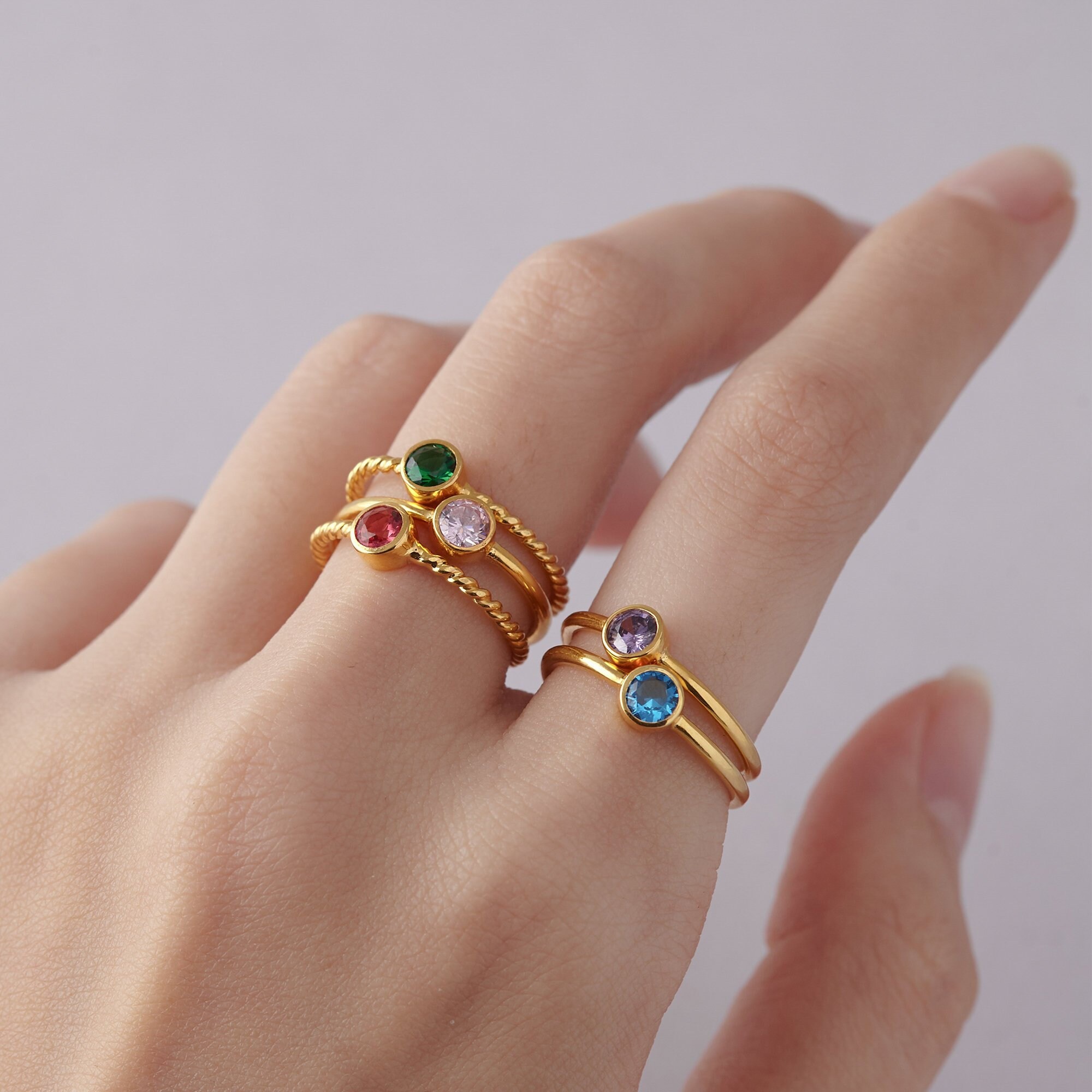 A Birthstone Stacking Mothers Memory Ring Set