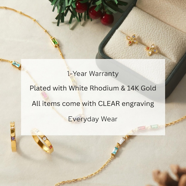 May include: Gold-plated jewelry set featuring a necklace, ring, and earrings. The necklace and bracelet have colorful gemstone accents. The earrings are flower-shaped with colorful gems. The ring has a band with colorful gems. The text in the image says "1-Year Warranty" and "Everyday Wear".