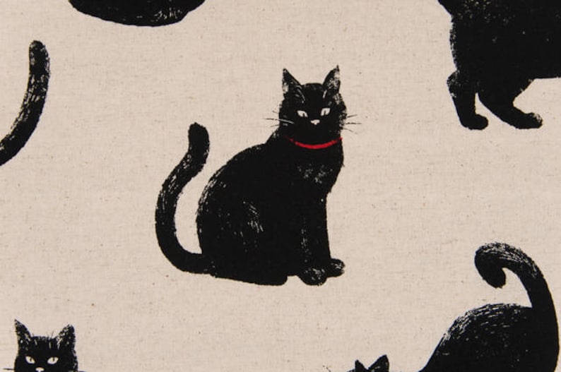 May include: A pattern of black cats on a white background. The cats are in various poses, some are sitting, some are standing, and some are curled up. One cat is wearing a red collar.