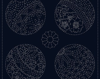May include: Four white embroidered circles on a dark blue background. Each circle features a different intricate design of flowers and geometric shapes.