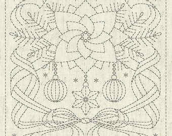 May include: A black and white embroidery design on a cream-colored fabric. The design features a stylized flower with ornaments and a bow.