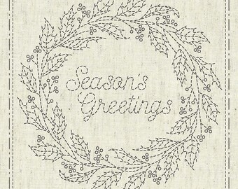 May include: A black and white image of a stitched wreath with the text "Season's Greetings" in the center. The wreath is made of leaves and berries.