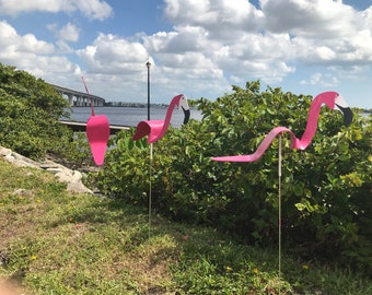 Bobbing twirling Flamingos