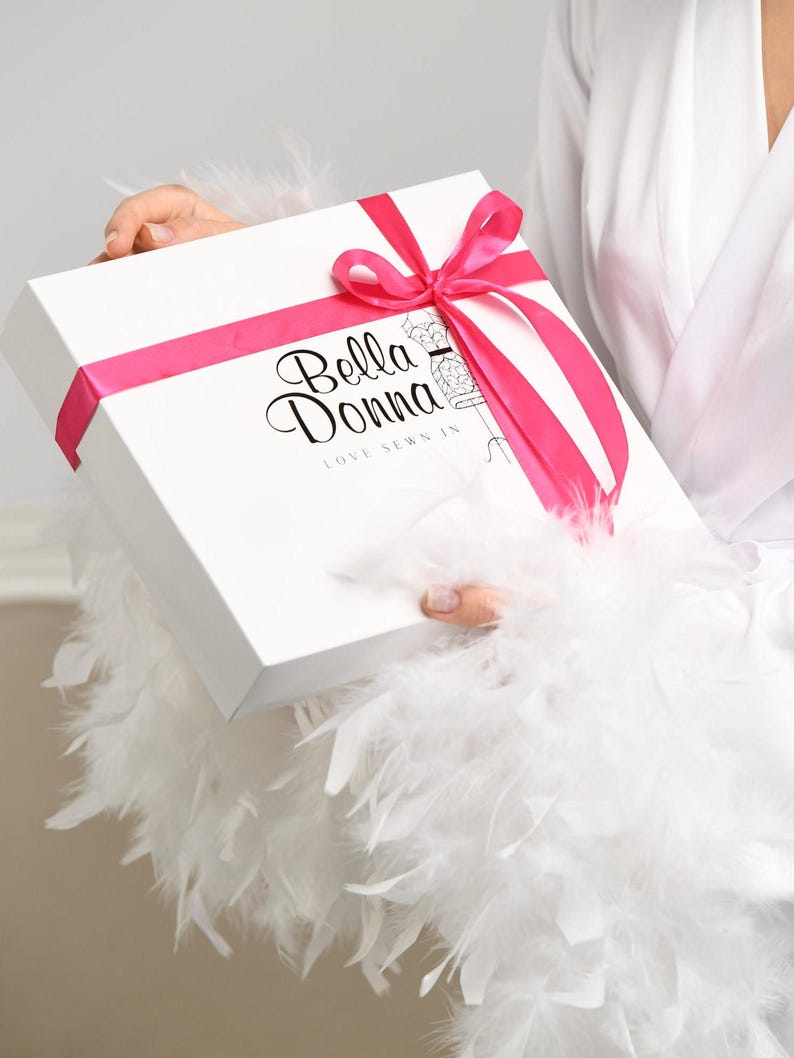 luxury bridal gift box with ‘Bella Donna’ logo and a pink satin ribbon bow. Perfect for wedding morning or special occasions.