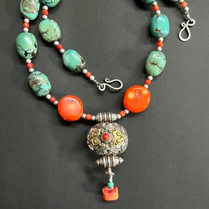 Sterling Silver Tibetan Ghau with orange coral Cabochon, large turquoise & orange coral gemstone Vintage Nepalese necklace.
