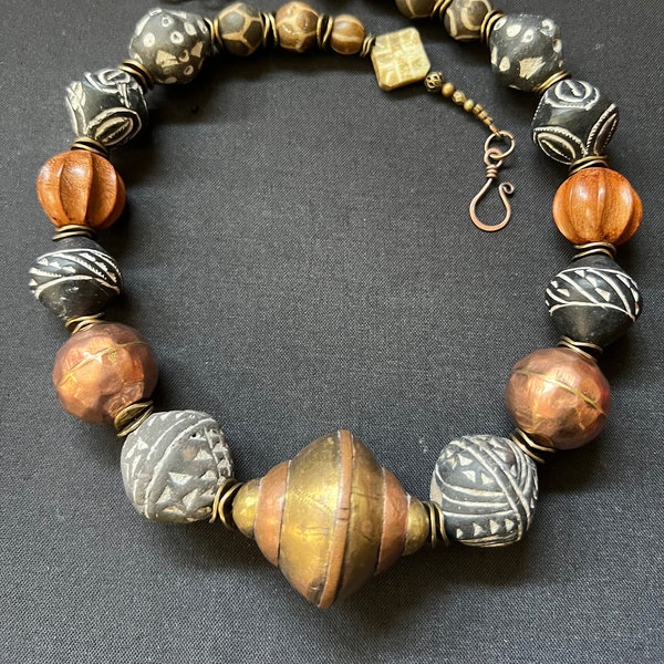 Tuareg brass & copper pendant with Etched Spindle Whorl clay beads Moroccan vintage beaded African handmade bohemian necklace.