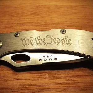 Buck 722 Spitfire Engraved with &quot;We the People&quot;