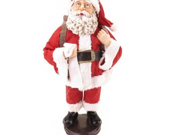 Clothtique Style Santa with List and Backpack of Toys 10"