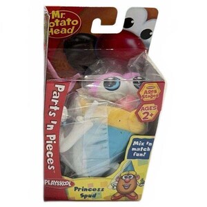 May include: A Mr. Potato Head Princess Spud toy set in its original packaging. The box features the text Parts 'n Pieces, Ages 2+, and Mix 'n match fun. The set includes a potato-shaped body, a blue dress, and various facial features.