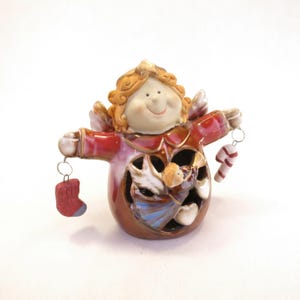 Charming Ceramic Angel 4.5&quot; tall with Stocking and Candy Cane