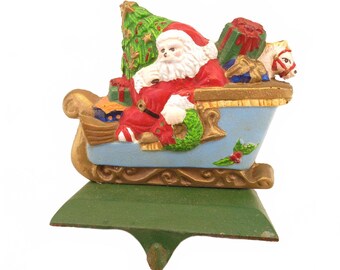 Soporte para calcetín navideño con diseño vintage de Papá Noel espeluznante y trineo