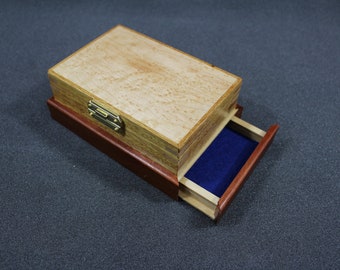 Keepsake boxes with hidden compartments