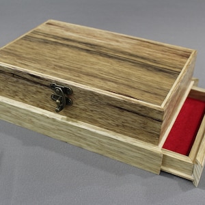 Black Limba boxes with concealed drawers