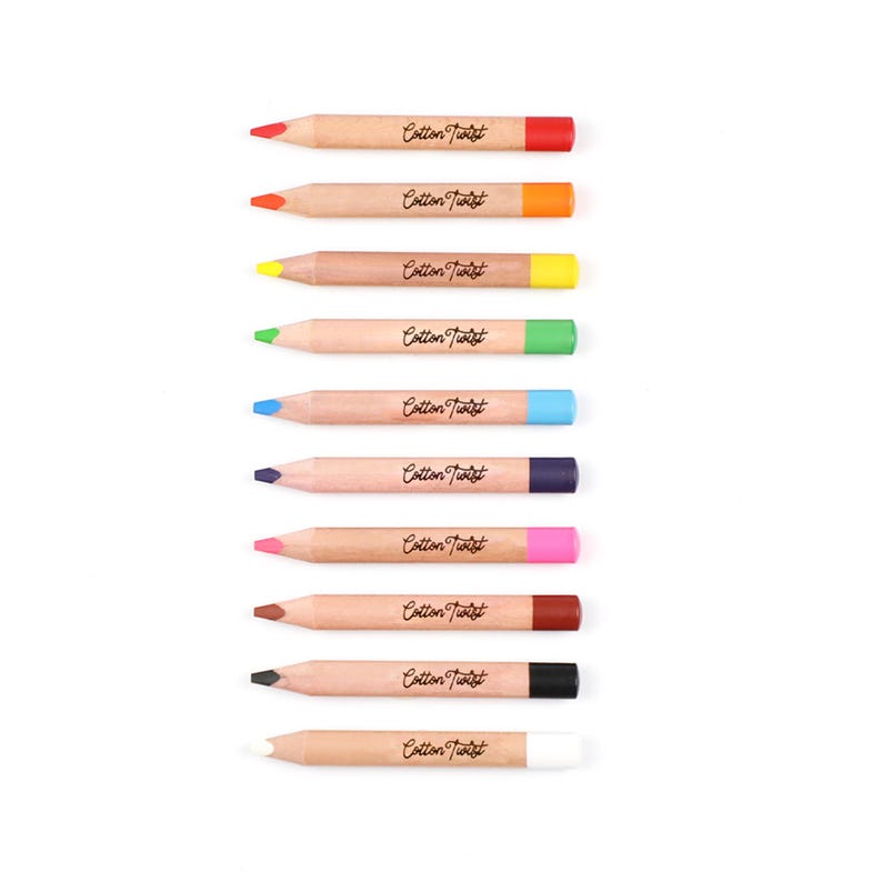 May include: A collection of ten colored pencils with natural wood barrels and brightly colored tips. Each pencil has the text "Cotton Twist" printed on the side. The tips are red, orange, yellow, green, blue, purple, pink, brown, black, and white.