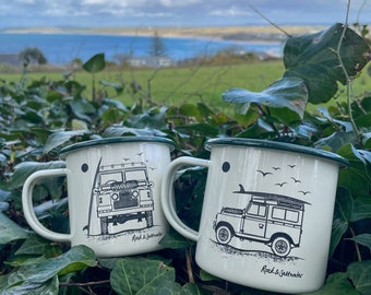 Set of 2 Land Rover with surfboard and beach scape enamel mugs. Cream and green enamel mugs – perfect camping mug or gift.
