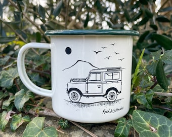 Land Rover side view with mountain. Cream and green enamel mug – perfect camping mug or gift.