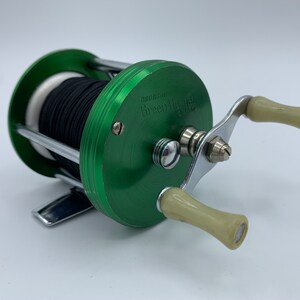 bait fishing lures PK Bass Lure - 2 Pack created by an over Item Number Issue Color:Chameleon Black Raven Helix Centerpin Reel