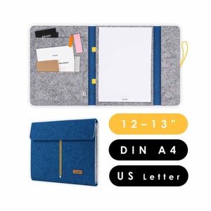 May include: A blue felt folder with a yellow zip and a grey felt folder with a yellow zip. The folders are open and show a white sheet of paper inside. The folders are labelled "12-13", "DIN A4", and "US Letter".