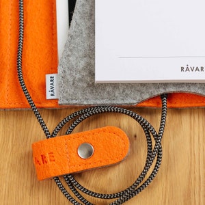 Functional cable holder for headphones or charging cables, stylish cable organizer in many colors for customization (OWE)
