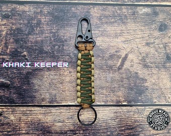 Portachiavi con clip per fucile in paracord terroso realizzato a mano