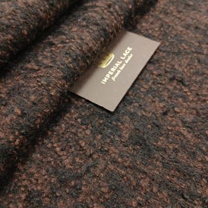 Texturerat ulltyg - Brunt och svart vinterjackamaterial