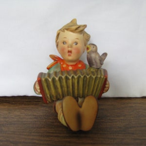 Hummel, "Let's Sing," Seated Boy with Accordian, vintage figurine by Goebel TM-2
