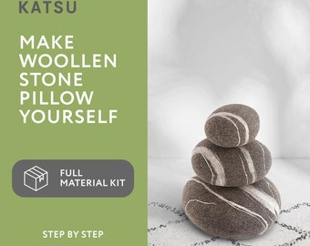 A set of materials for a video tutorial on making a soft KATSU stone pillow from wool with your own hands. Stone pillow 35cm. Master Class