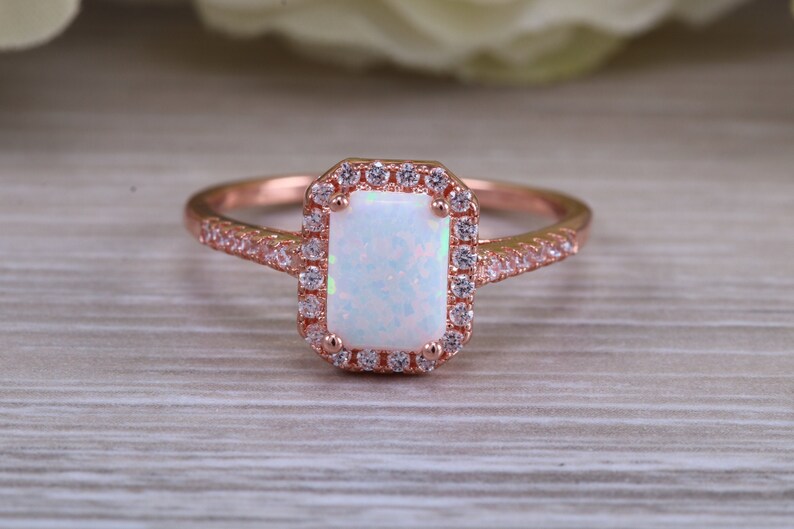 solid sterling silver ring further 18ct rose gold plated Very sparkly and fiery Opal and cubic zirconia set dress ring