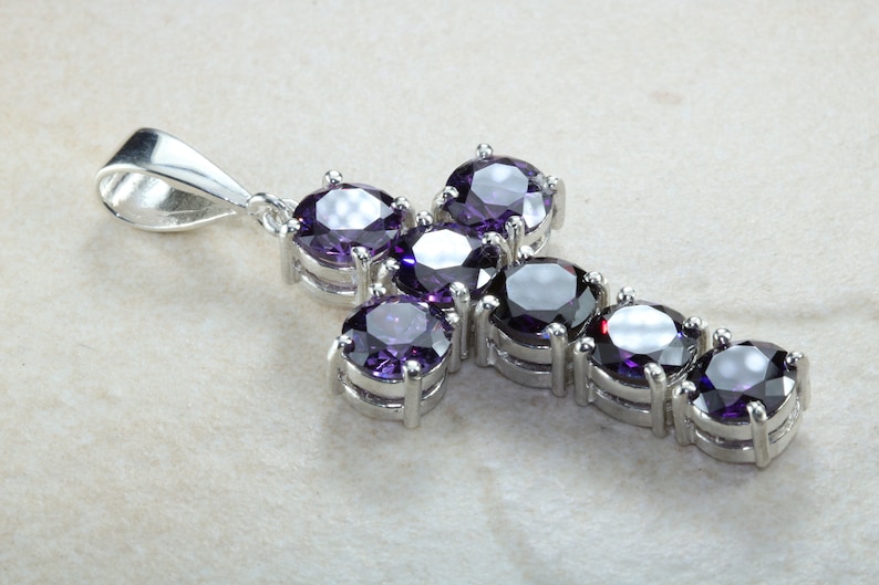 Stone set cross. Very large and chunky sterling silver cross set with Amethyst cubic zirconias